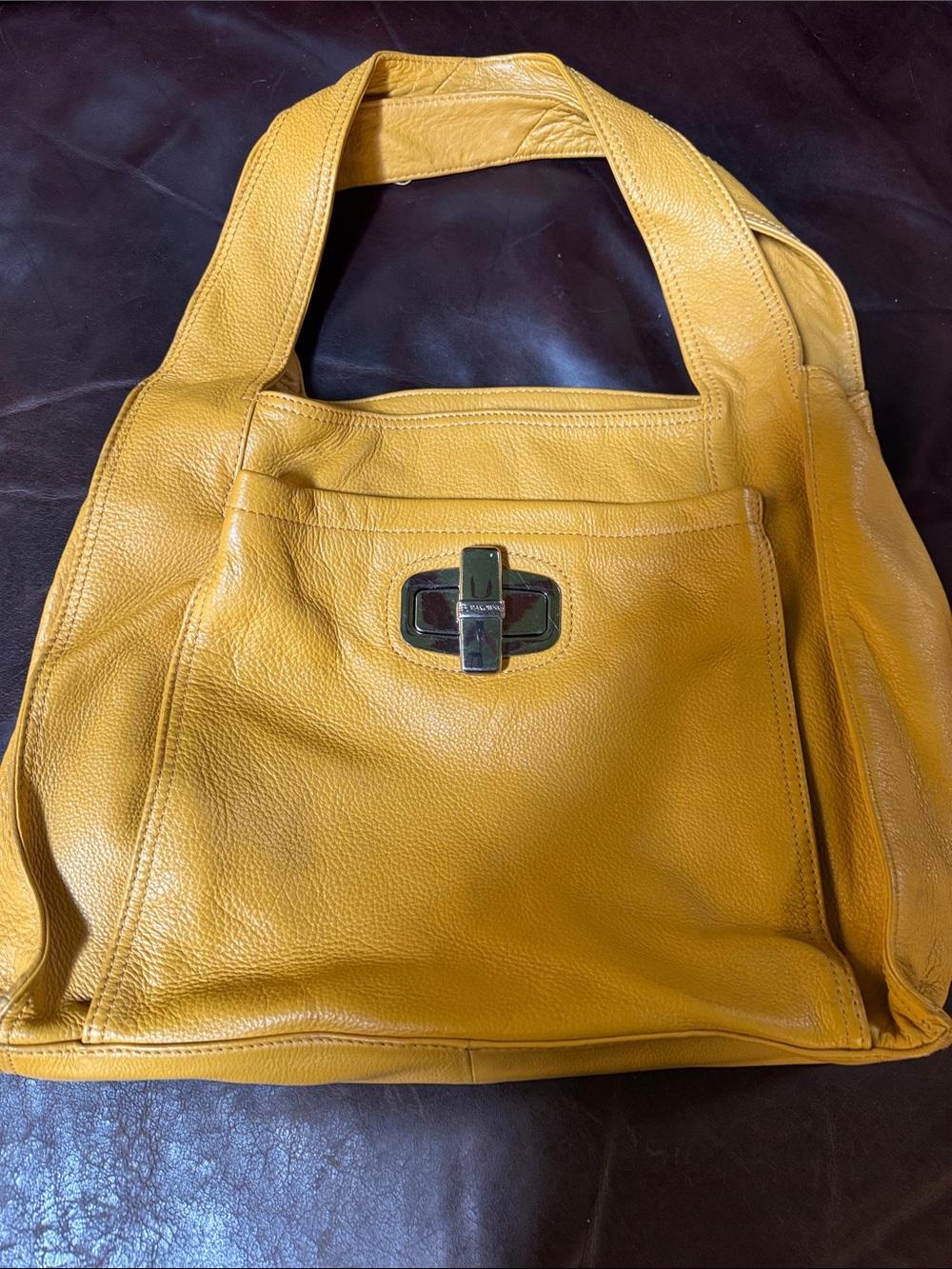B. Makowsky Spacious Mustard Yellow Leather Hobo with Turn-Lock Detail.